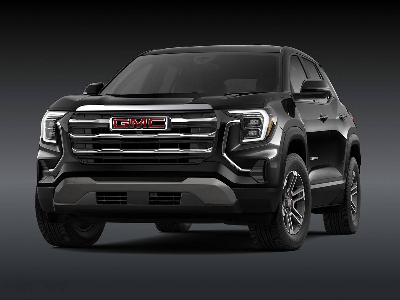 A Front View of a 2026 GMC Elevation SUV in Black with a Chrome Grille