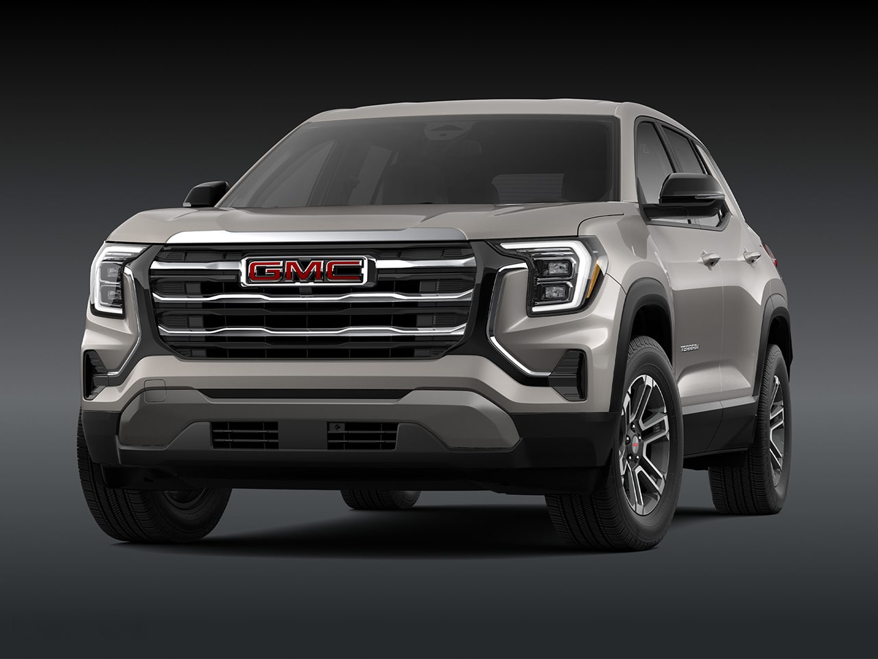A Front View of a 2026 GMC Elevation SUV in Light Gray with a Chrome Grille
