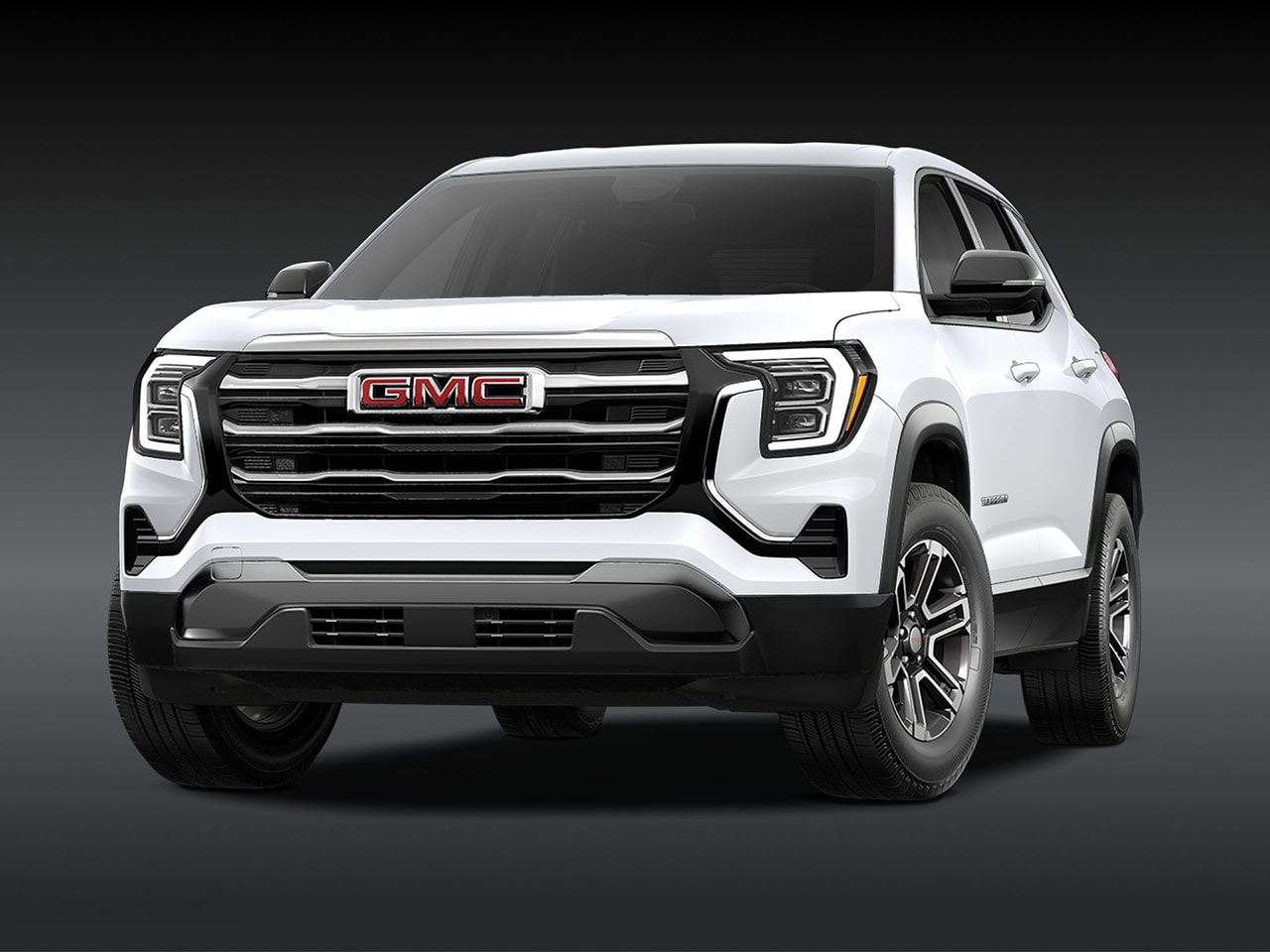 A Front View of a 2026 GMC Elevation SUV in White with a Chrome Grille