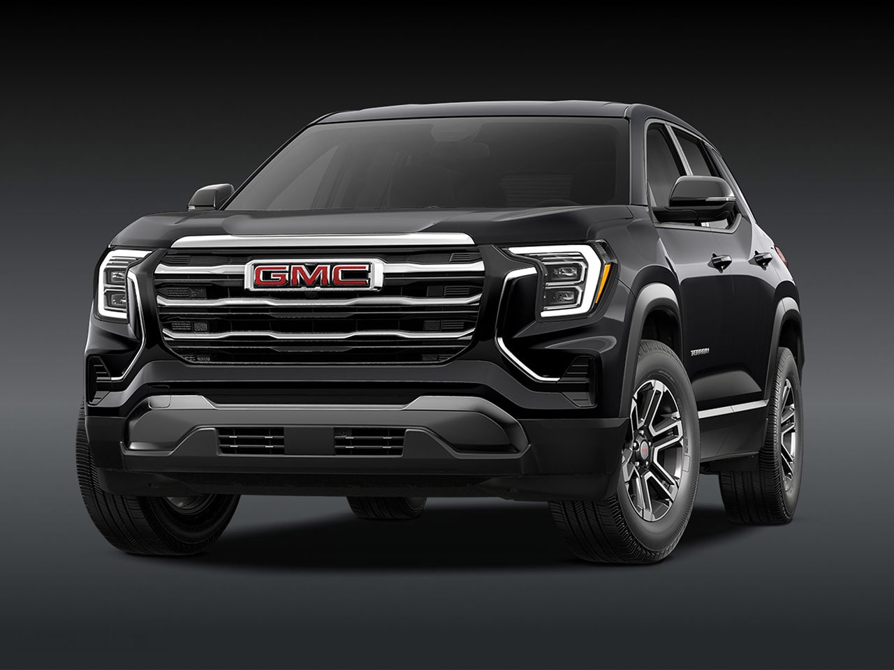 A Front View of a 2026 GMC Elevation SUV in Black with a Chrome Grille