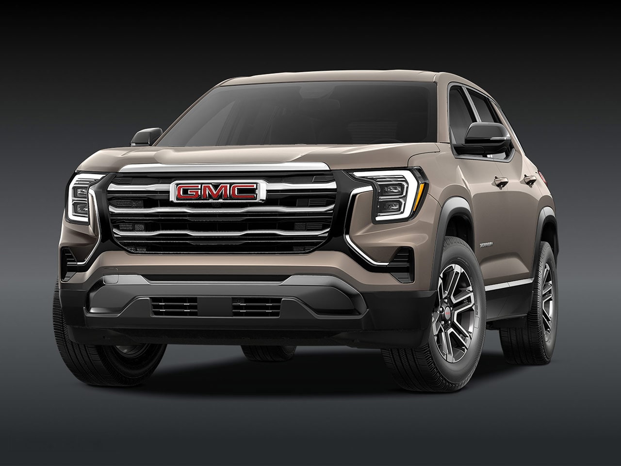 A Front View of a 2026 GMC Elevation SUV in Light Gray with a Chrome Grille