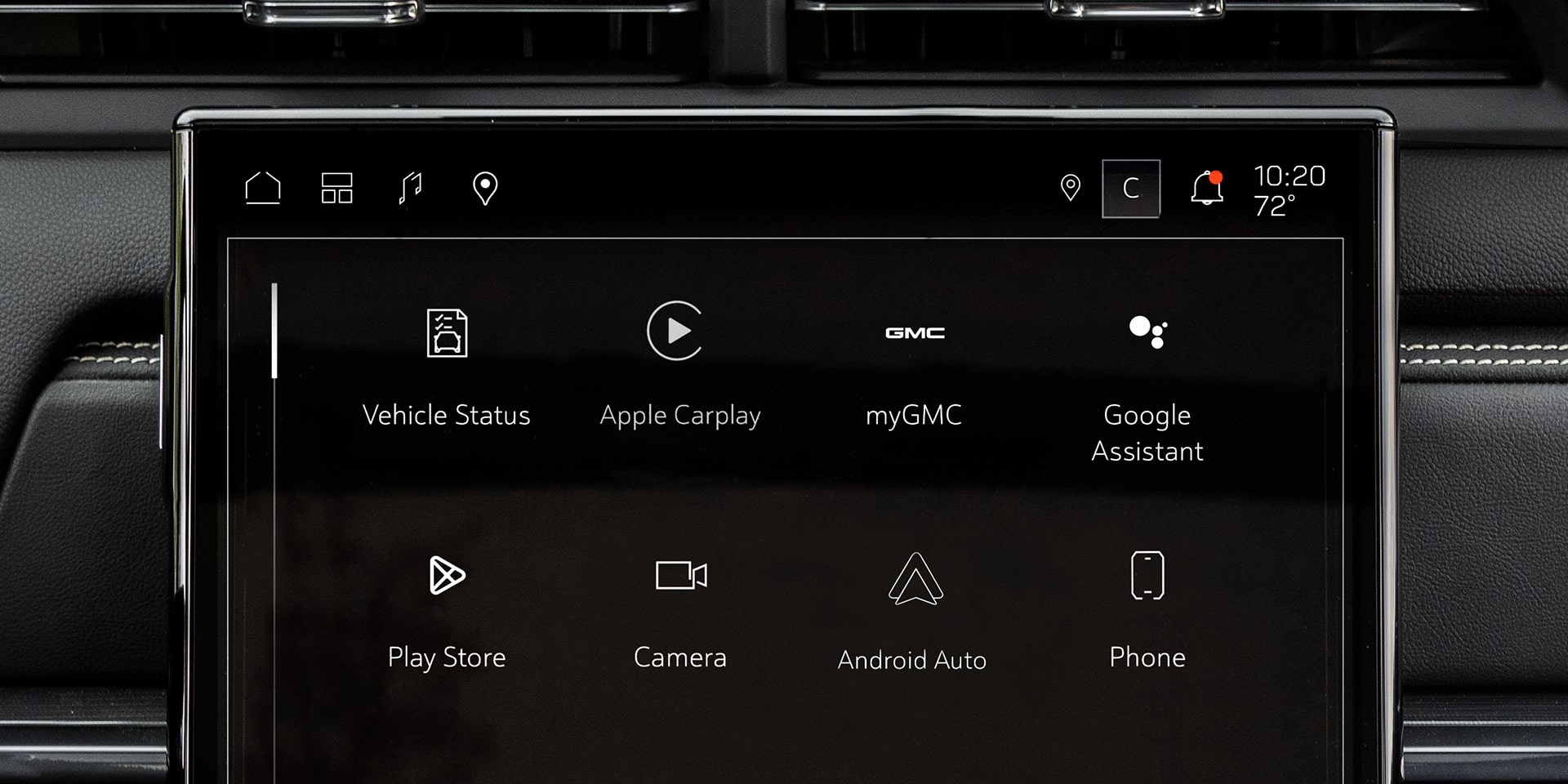A GMC Vehicle's Black Infotainment Screen Displaying Core Applications Including Vehicle Status, Drive Modes, myGMC, and Google Assistant