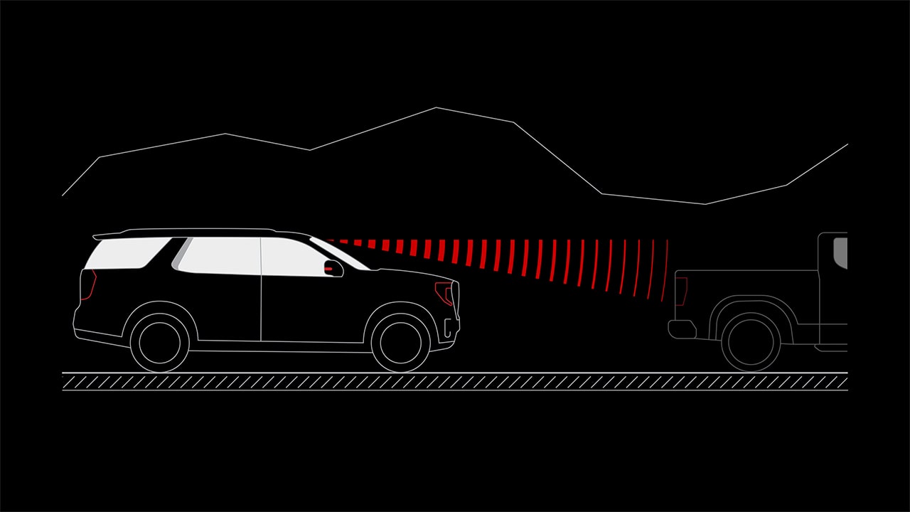Graphic Illustration of a GMC Yukon Using Forward Collision Alert to Detect a Pickup Truck Ahead on the Road