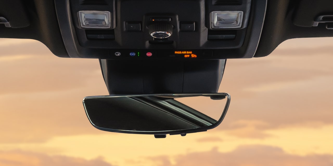 Overhead Console and Rearview Mirror with a Passenger Air Bag Off Indicator in the 2027 GMC Yukon