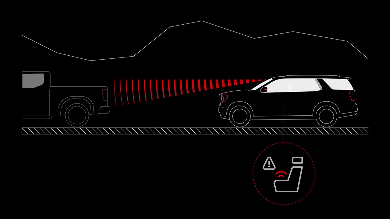 Graphic Illustration of a GMC Yukon Using Safety Alert Seat Technology to Detect a Nearby Pickup Truck