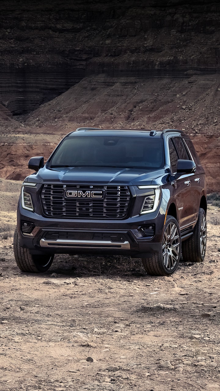 The 2027 GMC Yukon and Yukon XL SUVs Parked in the Desert