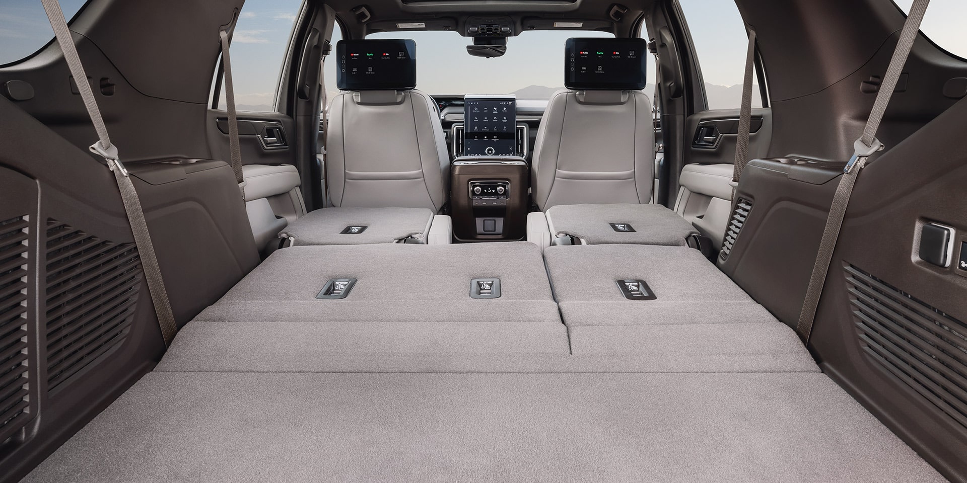 Expansive Cargo Space of a GMC Yukon XL with All Rear Seats Folded Flat for Maximum Storage