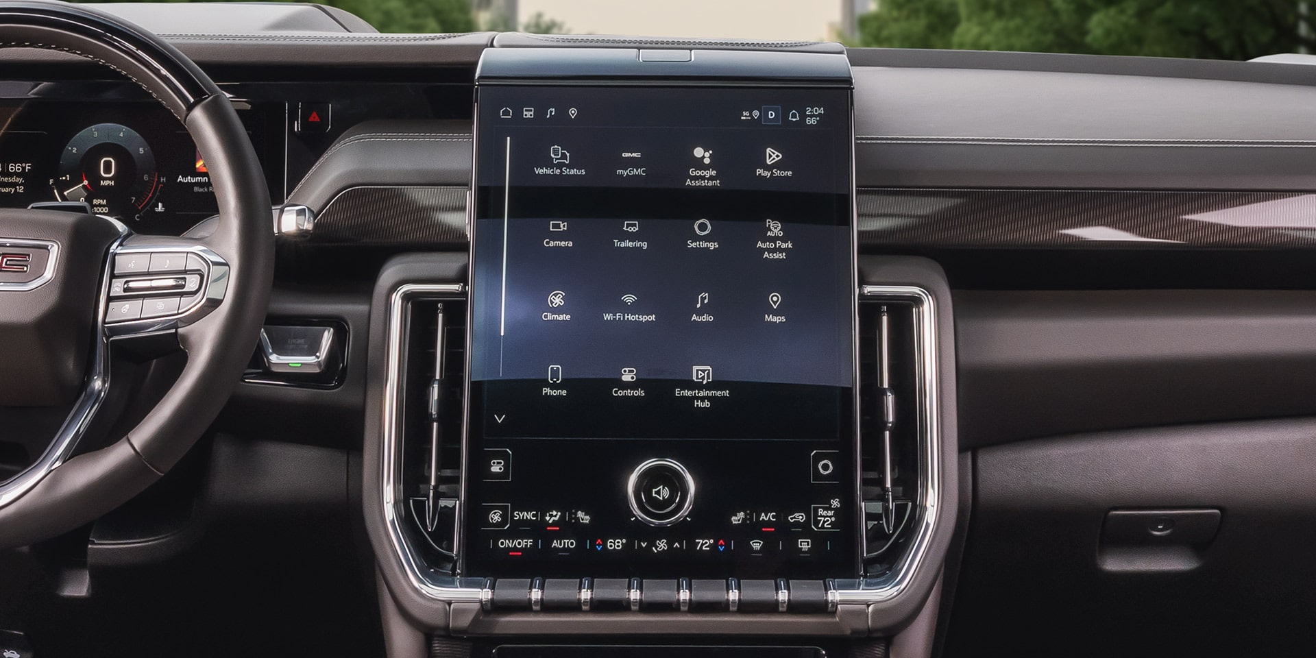 Dashboard of a GMC Yukon XL with a Large Infotainment Touchscreen Displaying App Icons
