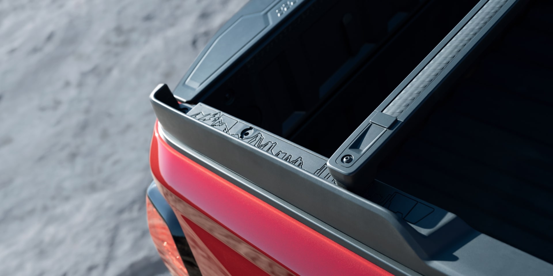 An Overhead View of the Truck Bed and a Retractable Tonneau Cover of a 2027 GMC Canyon