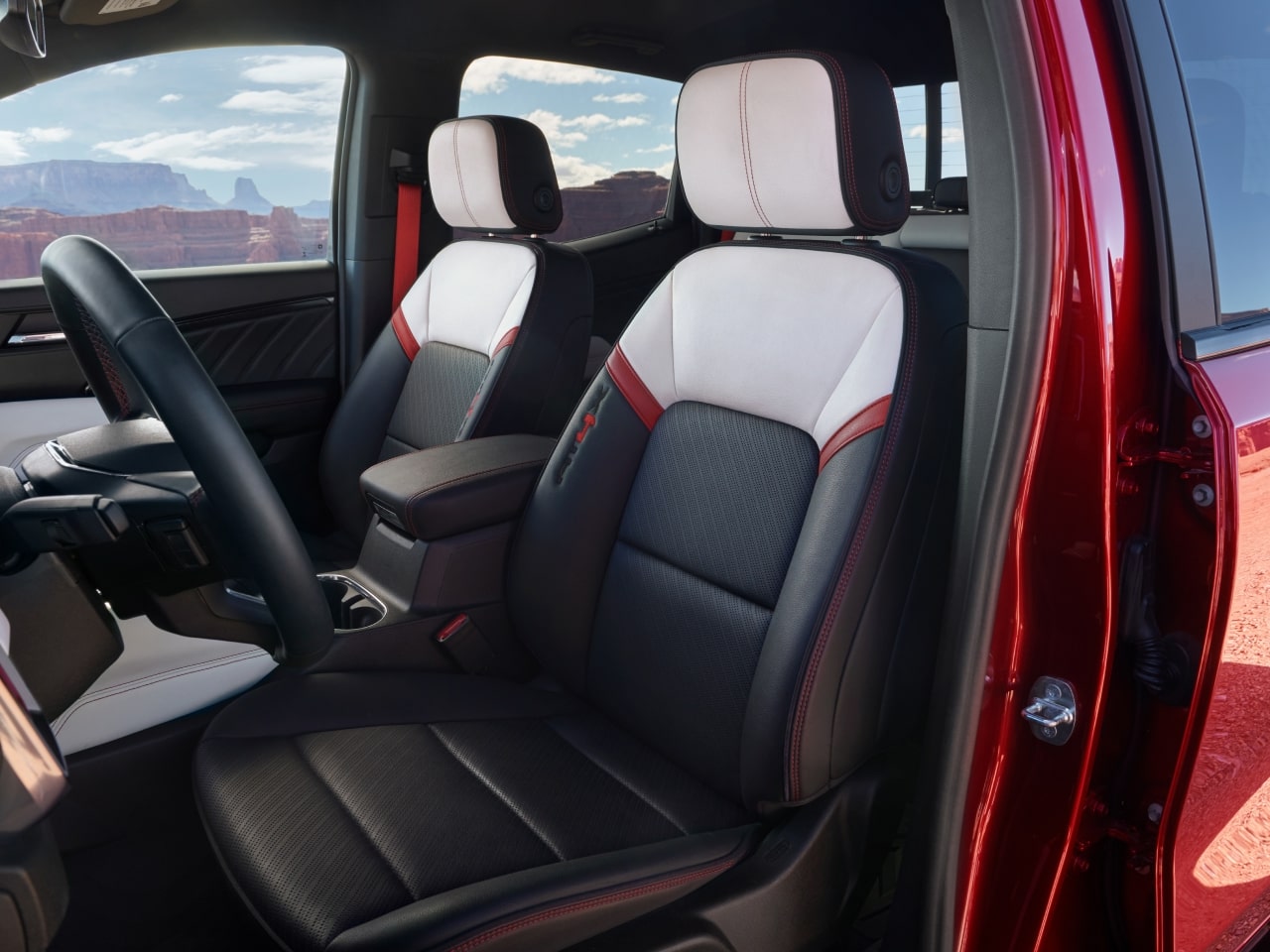 The Red and White Two-Tone Interior Seats of a 2027 GMC Canyon AT4X