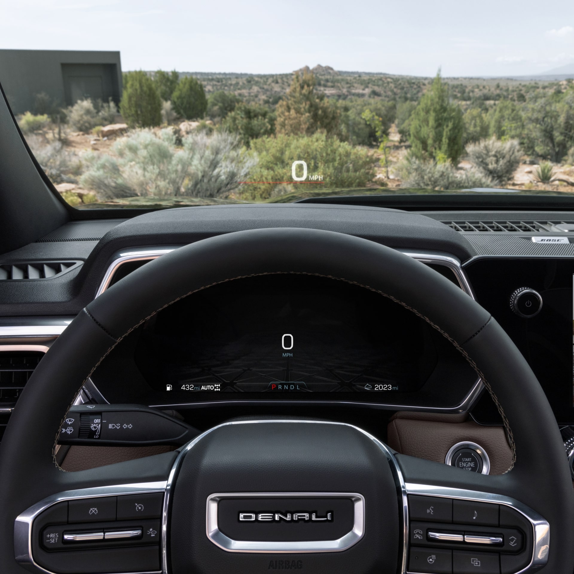 Interior of the 2027 GMC Canyon Dashboard with a Large Infotainment Screen and Brown and Black Trim