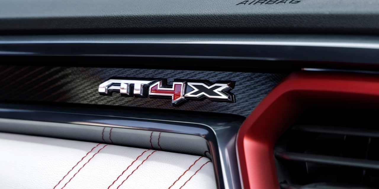 The AT4X Trim Badge on the Dashboard of a 2027 GMC Canyon