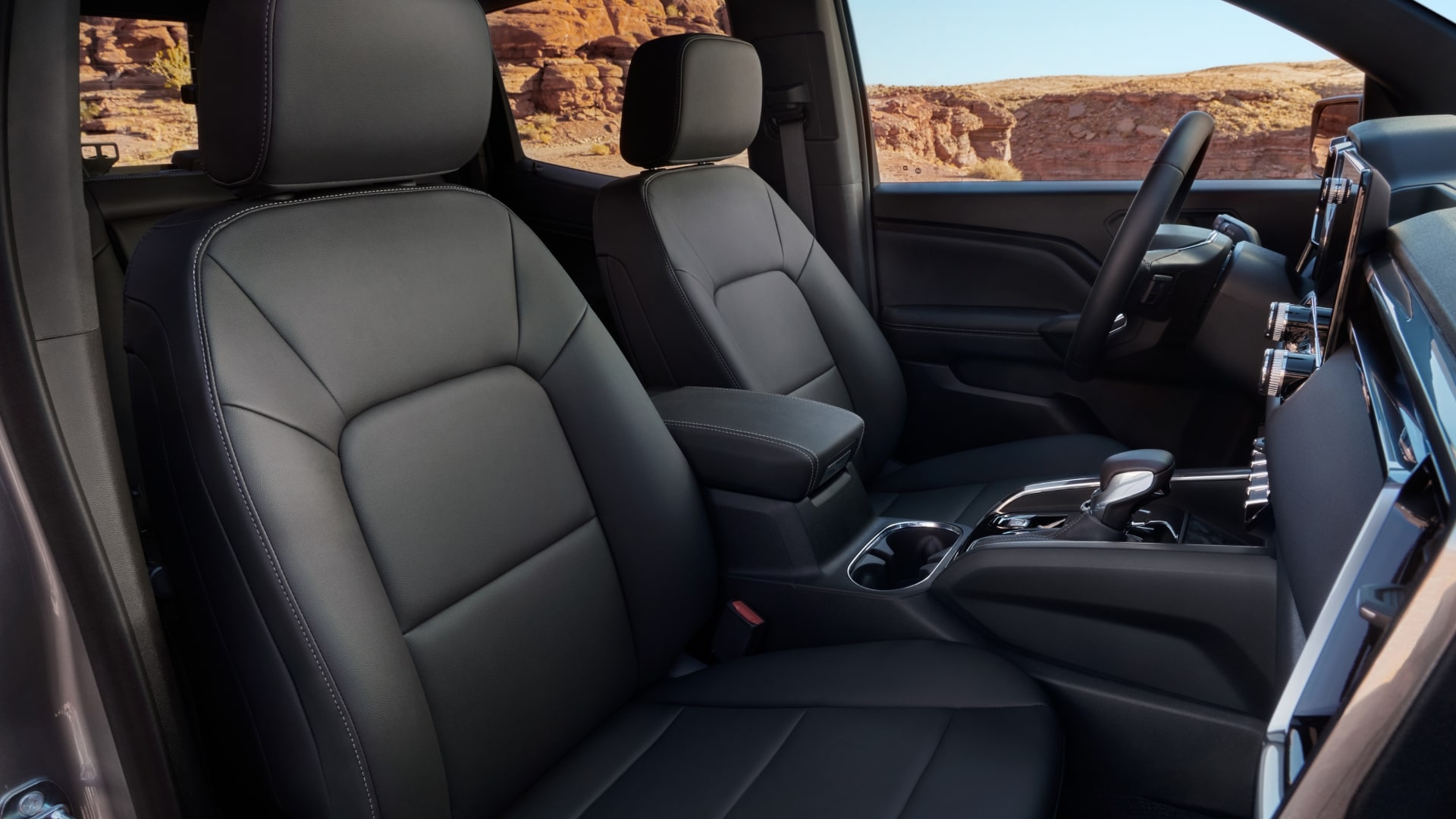 The Black Leather Front Seats of a 2027 GMC Canyon