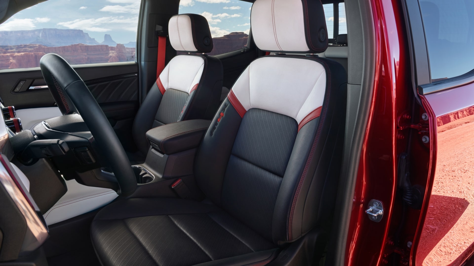 The Red and White Two-Tone Interior Seats of a 2027 GMC Canyon AT4X