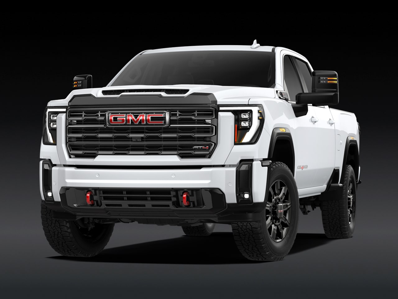 A Front View of the White 2027 GMC Sierra HD AT4