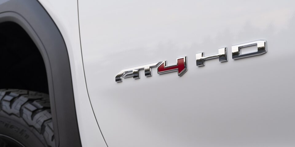 Closeup on the GMC Sierra HD AT4 Nameplate
