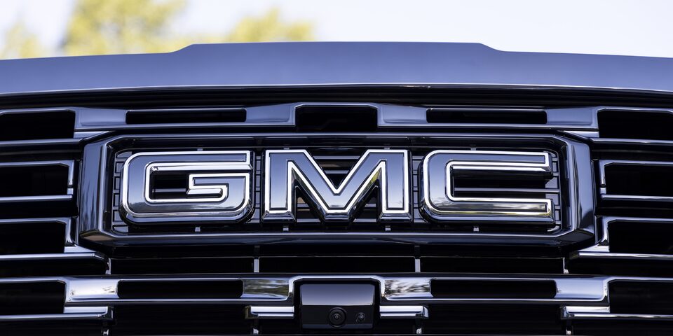 Closeup on the GMC Nameplate and Grille on the Sierra HD