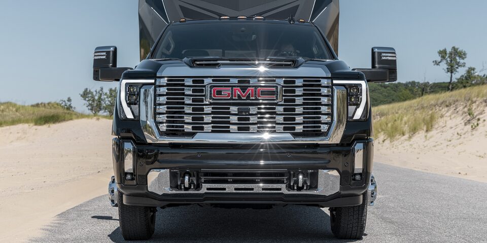 Head-On Shot of the GMC Sierra HD Denali Towing a Trailer