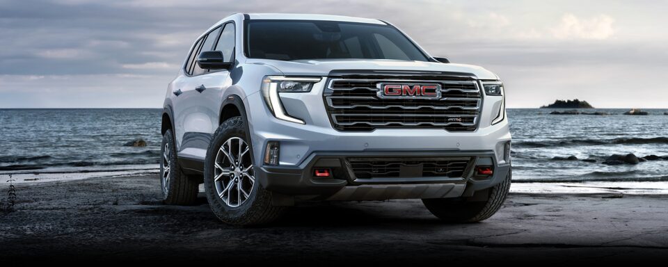 A 2024 GMC Acadia AT4 Parked Off-Road Near the Beach