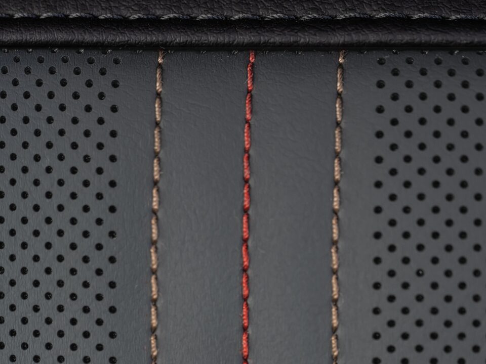 Close-Up on the Stitched Leather on the Seating of the 2024 GMC Acadia AT4