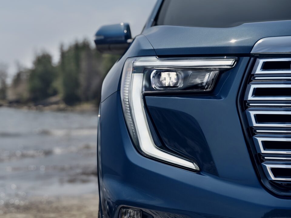 Close-Up on the 2024 GMC Acadia Denali Front Headlight