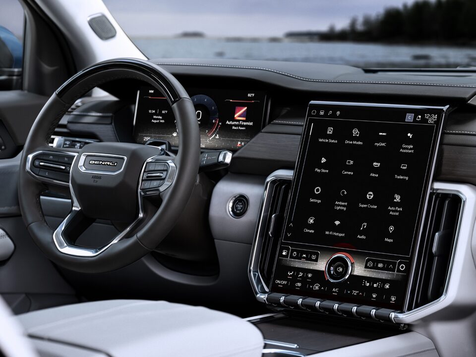 Close-Up on the 2024 GMC Acadia Denali Steering Wheel and Infotainment System