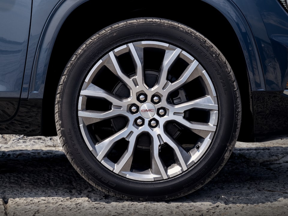 A Side Profile View of the 2024 GMC Acadia Denali Wheel and Rim