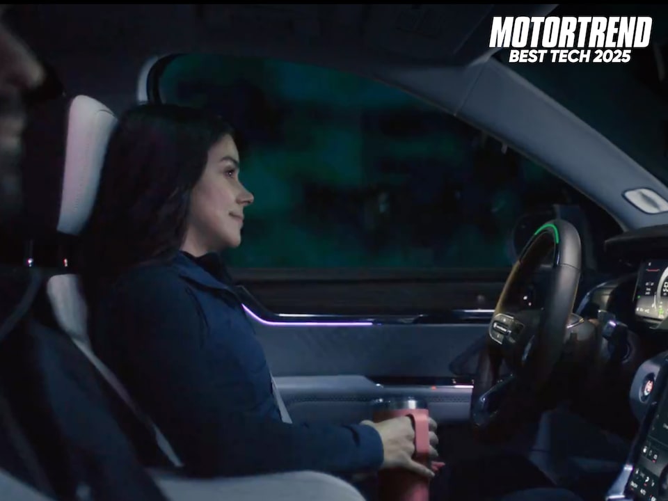 View of a Driver Using the Super Cruise Feature in a 2024 GMC Acadia Denali SUV