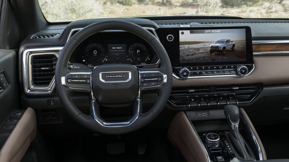 Closeup on the Steering Wheel and Infotainment System of the Powerful New GMC Canyon AT4X