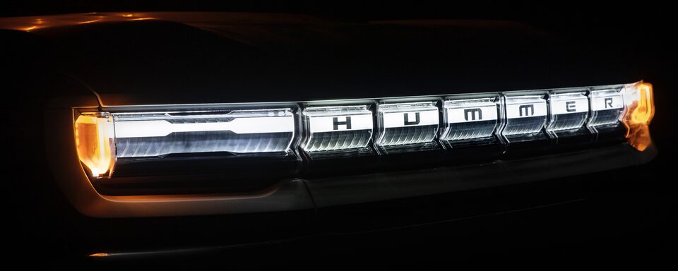 2020 GMC HUMMER EV Electric Truck with Headlights On Close Up