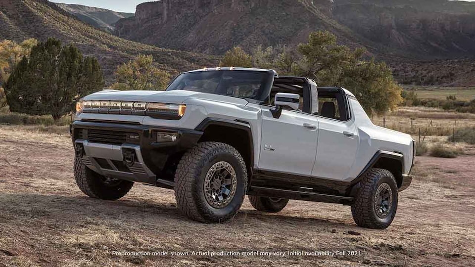 2021 GMC HUMMER EV Electric truck driving up hill