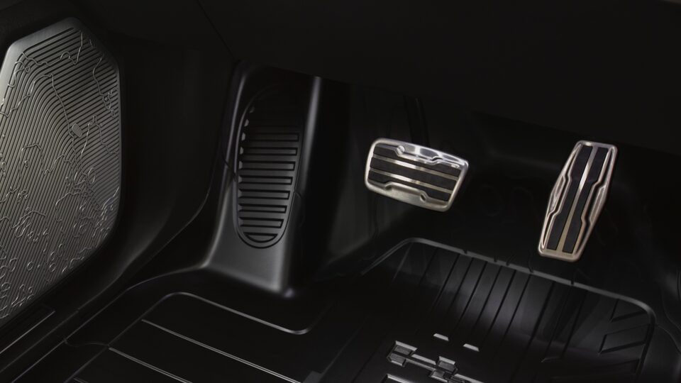 GMC HUMMER EV electric SUV gas and brake pedals close up