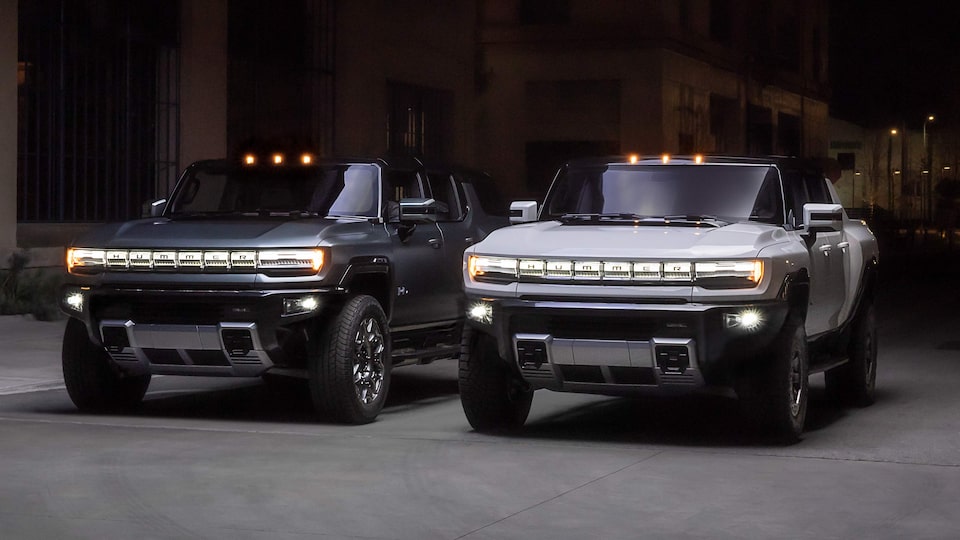 GMC HUMMER EVs electric truck and electric SUV parked side by side