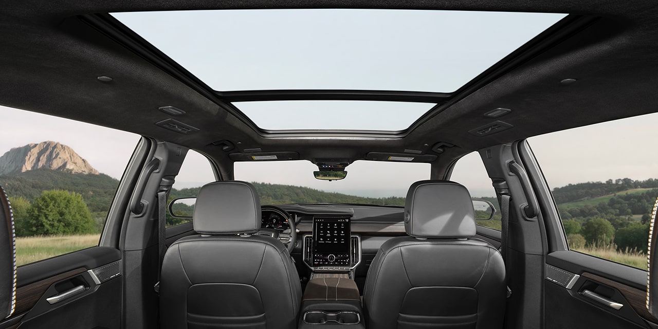 Interior View of the Panoramic Sunroof From the Second Row Seats in the 2026 GMC Acadia Denali Ultimate Luxury Mid-Size SUV