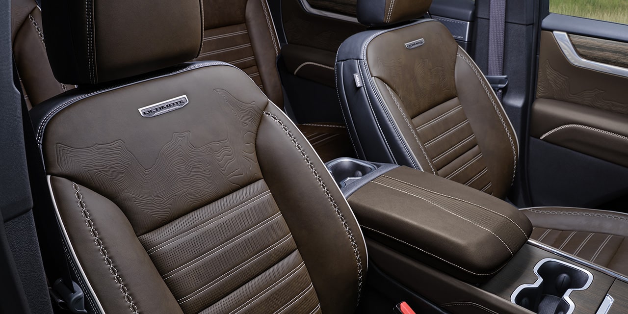 Close-up of the Full-Leather Front Row Seats in the 2026 GMC Acadia Denali Ultimate Luxury Mid-Size SUV
