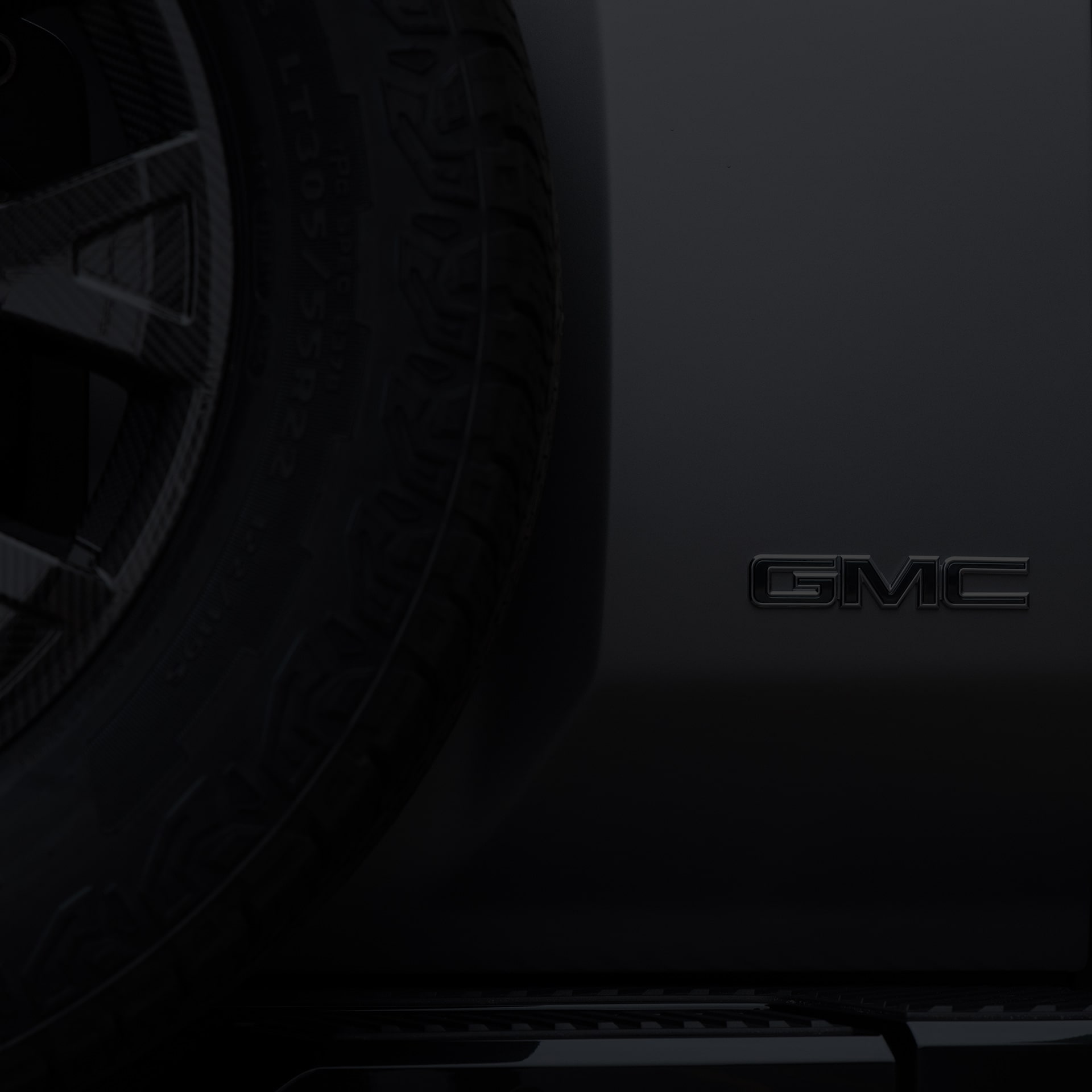 Close-up of the GMC Badging on the Side of the 2026 GMC HUMMER EV