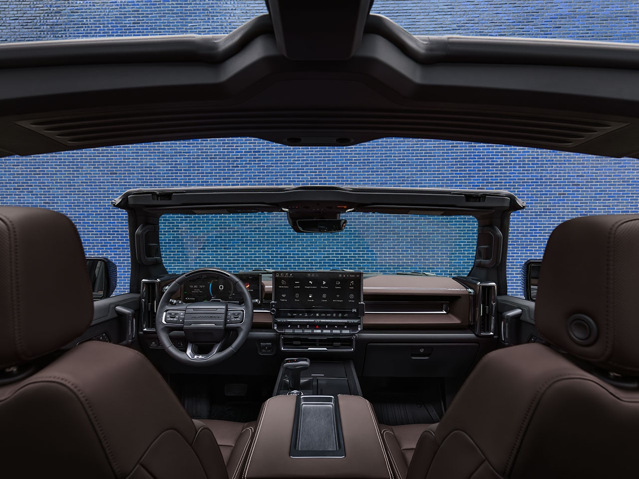 Interior View of the Front Seats, Steering Wheel and Dashboard in the 2026 HUMMER EV