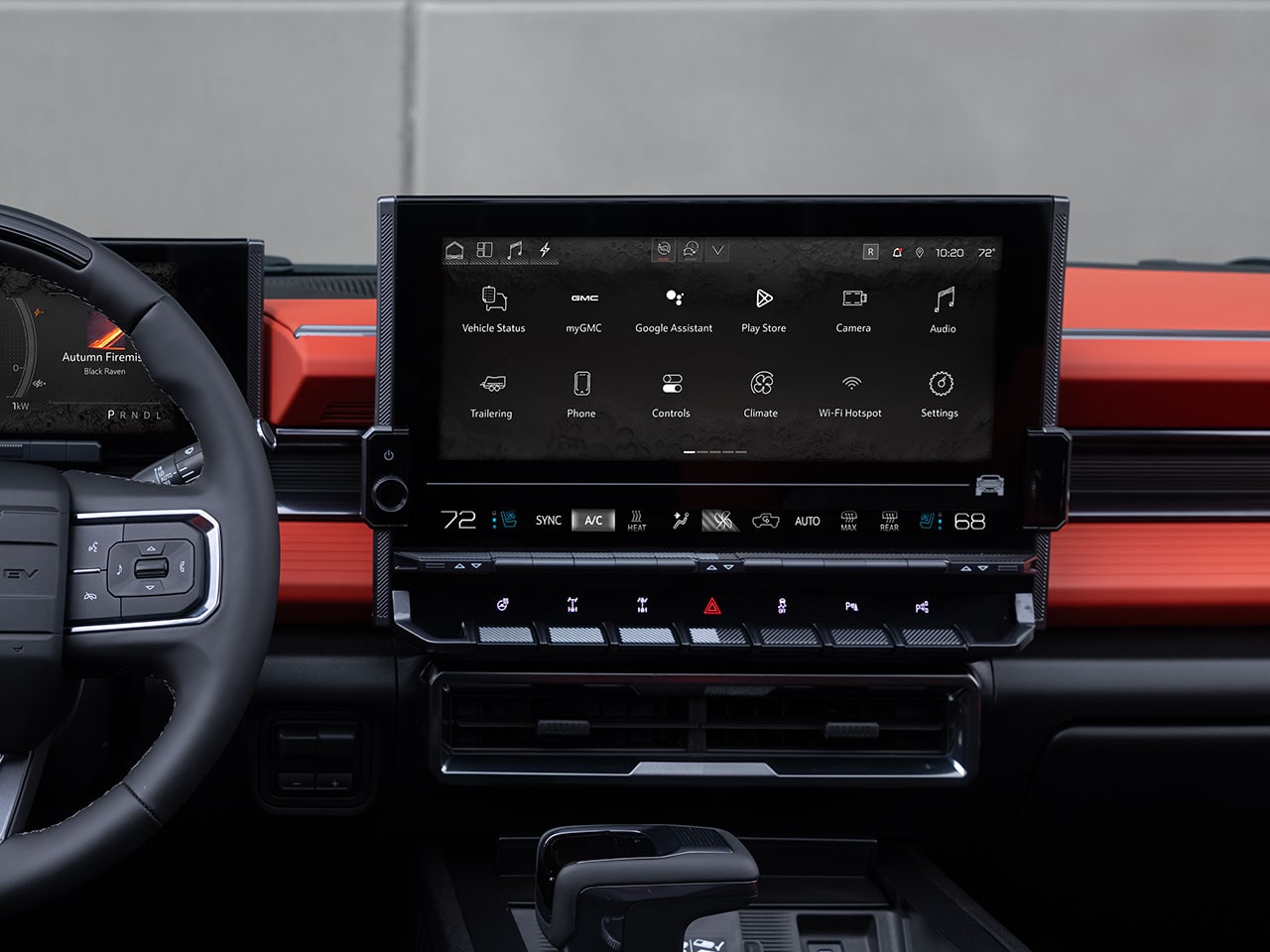 Close-up of the Interior of the 2026 GMC HUMMER EV Displaying the Steering Wheel and Large Infotainment System