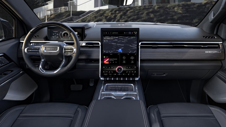 The Steering Wheel, Infotainment System and Center Console on the GMC Sierra EV