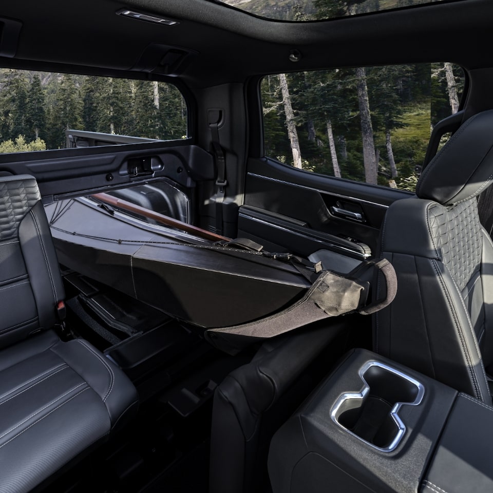 A Seat Down with Equipment in the Back Cabin of the GMC Sierra EV Denali