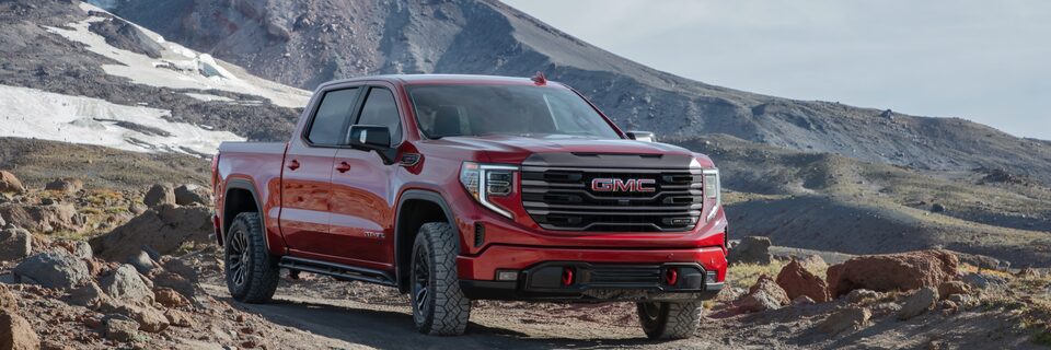 2022 GMC Sierra AT4 Off-Road Truck Exterior Three-Quarters View Parked