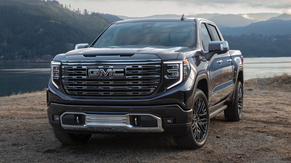 2022 GMC Sierra Denali Ultimate Luxury Truck in front of Mountains