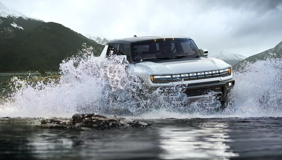 The Hummer EV Pickup Driving Through a Body of Water with Ease