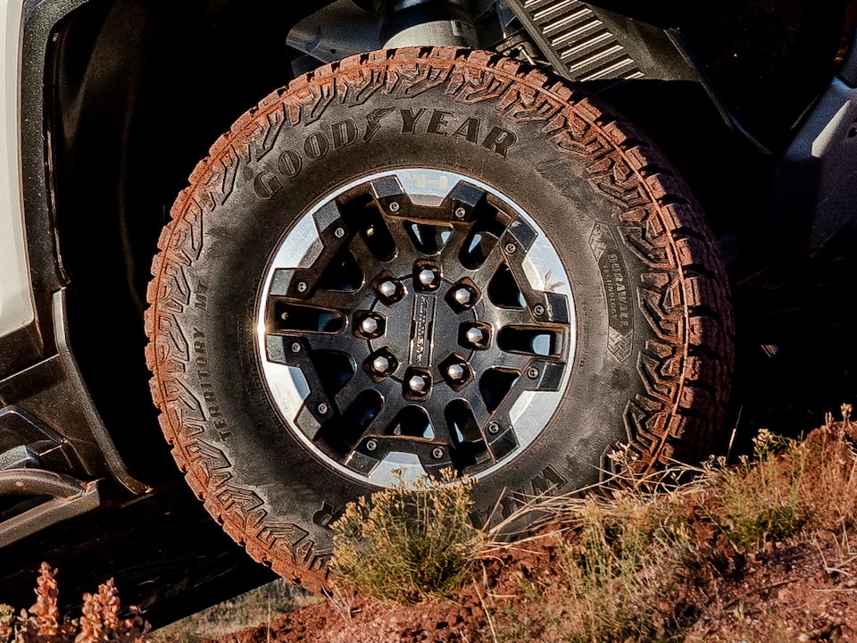 The Hummer EV's Off-Road Tire Caked in Sand 