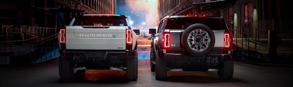 A Rear View Shot of the HUMMER EV SUV and Pickup Truck Side by Side