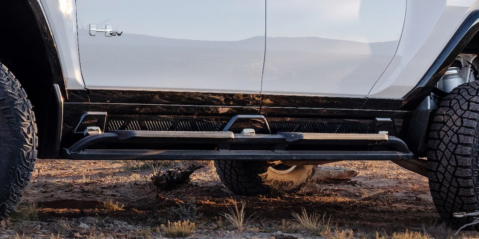 The Hummer EV Pickup Coasting Through the Desert on a Cloudy Day 