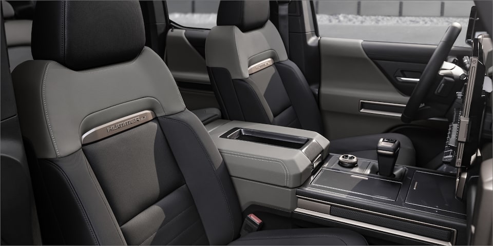 The Driver & Passenger Seating of the Hummer EV with the Lunar Shadow Interior Package 