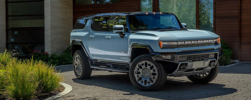 A GMC HUMMER EV SUV Driving Down the Highway