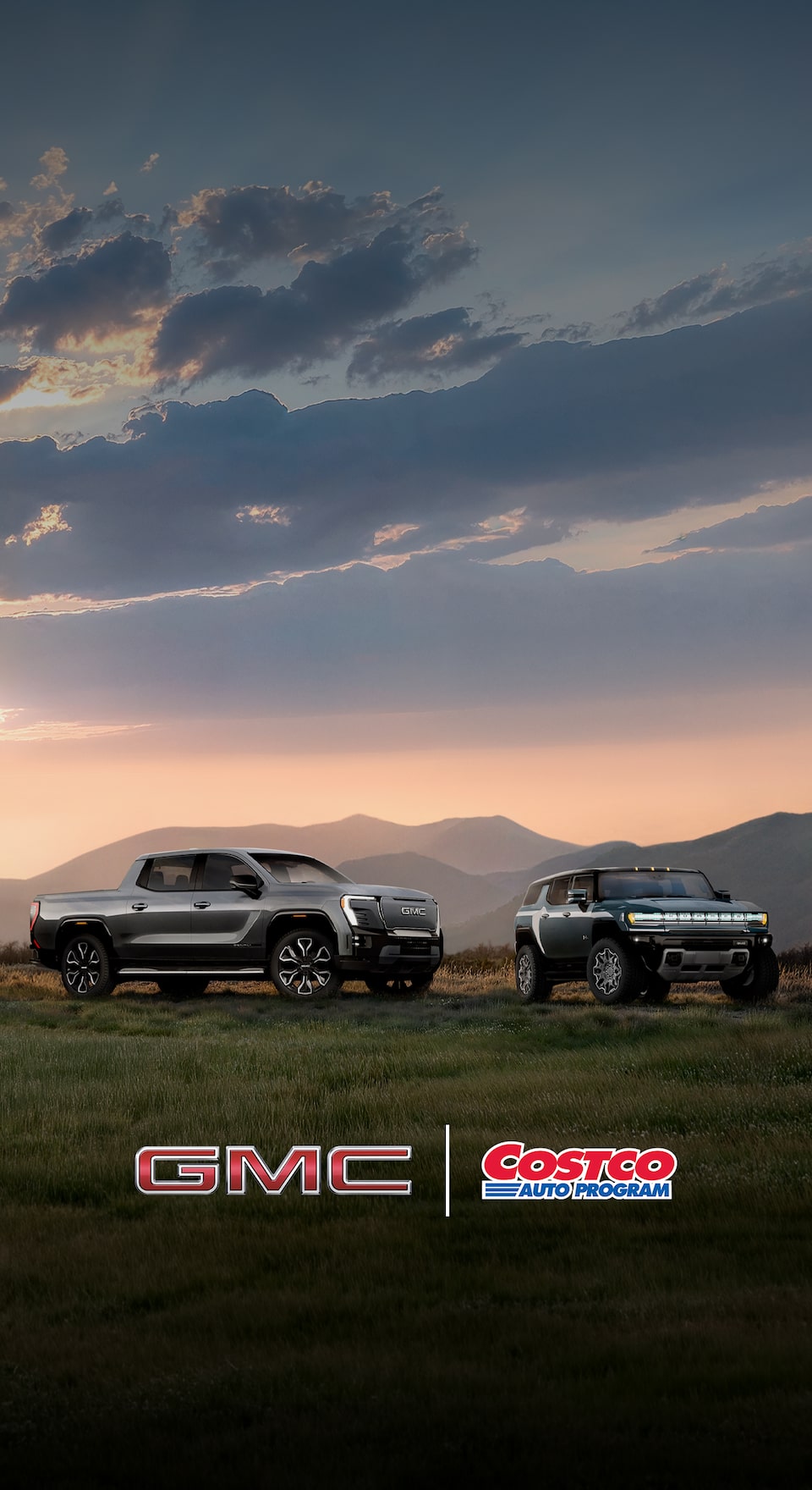 The GMC EV Lineup Parked in a Green Valley with Mountains in the Distance with Text Overlay: GMC COSTCO AUTO PROGRAM