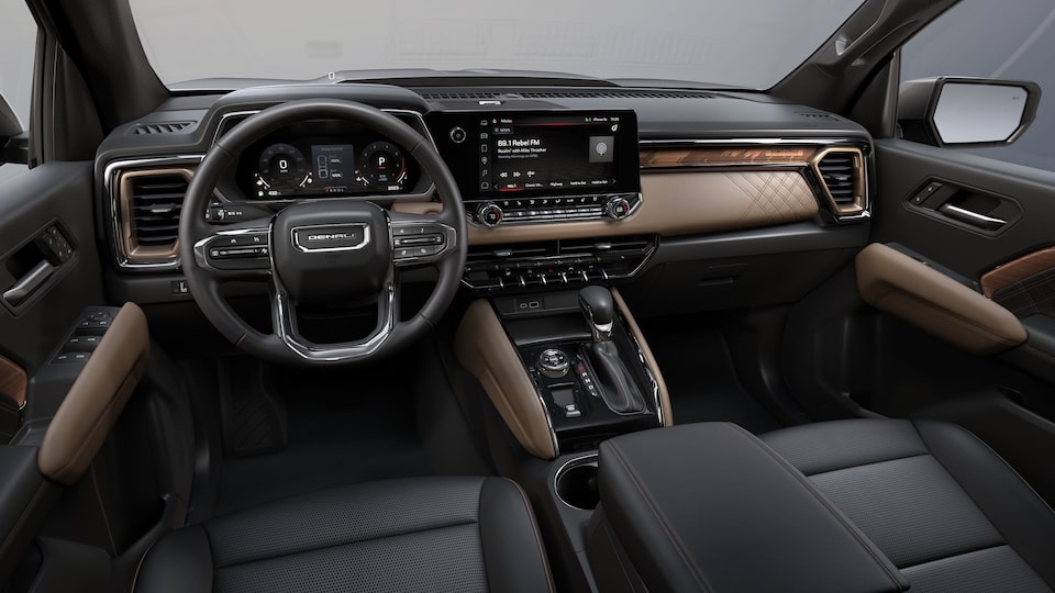 A Driver's View of the Front Interior with Jet Black Materials on the GMC Canyon Denali